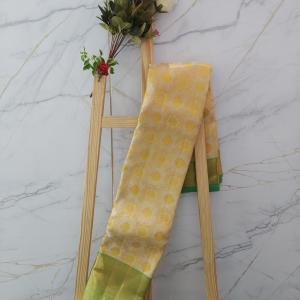 Kanchipuram Cream and Mustard Yellow Silk Saree with Contrast Green Zari Border