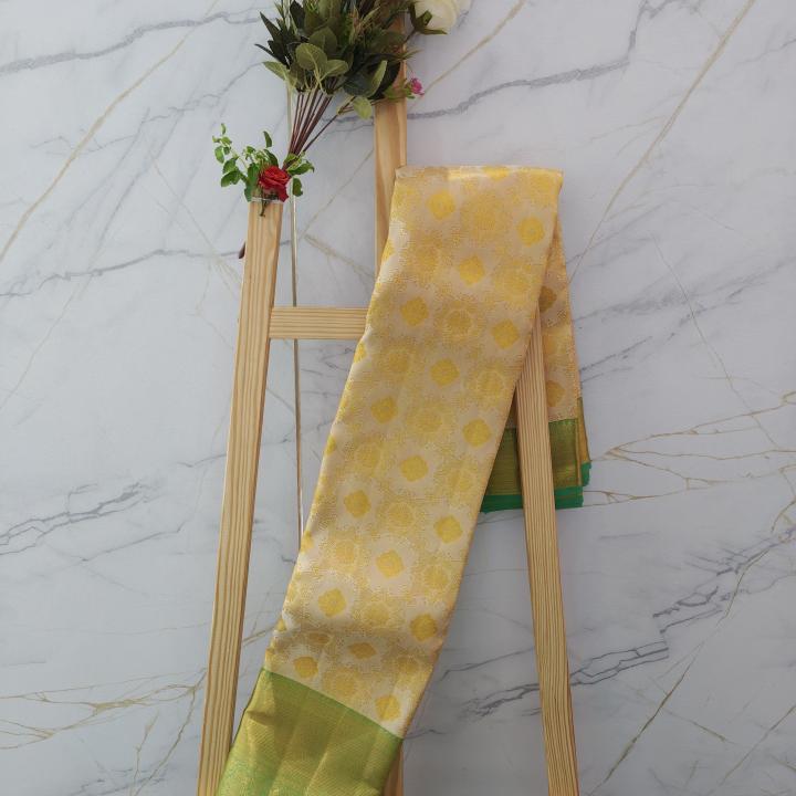 Kanchipuram Cream and Mustard Yellow Silk Saree with Contrast Green Zari Border