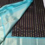 Jet Black Silk Saree with All-Over Gold Coin Buttas & Contrast Sea Green Border