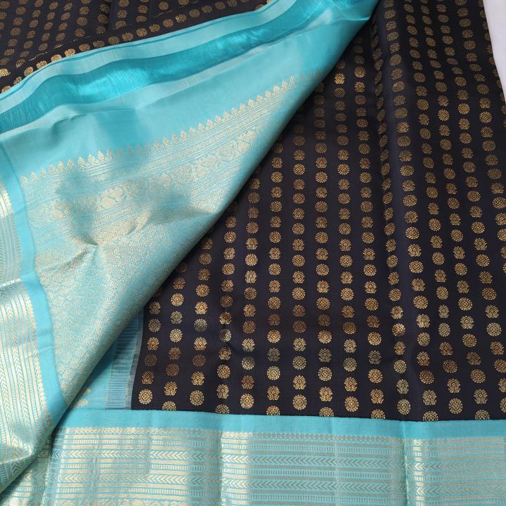 Jet Black Silk Saree with All-Over Gold Coin Buttas & Contrast Sea Green Border