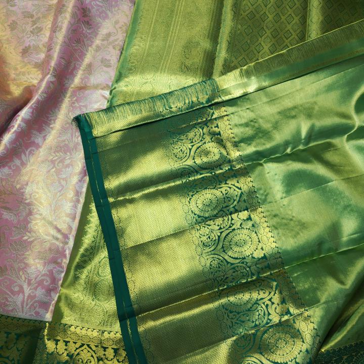 Peach-Pink Tissue Silk Saree with All-Over Gold Zari Jaal & Contrast Bottle Green Border