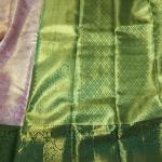 Peach-Pink Tissue Silk Saree with All-Over Gold Zari Jaal & Contrast Bottle Green Border