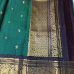 Kanchipuram Emerald Bottle Green Silk Saree with Gold Zari Peacock & Elephant Motifs & Dark Brown Border