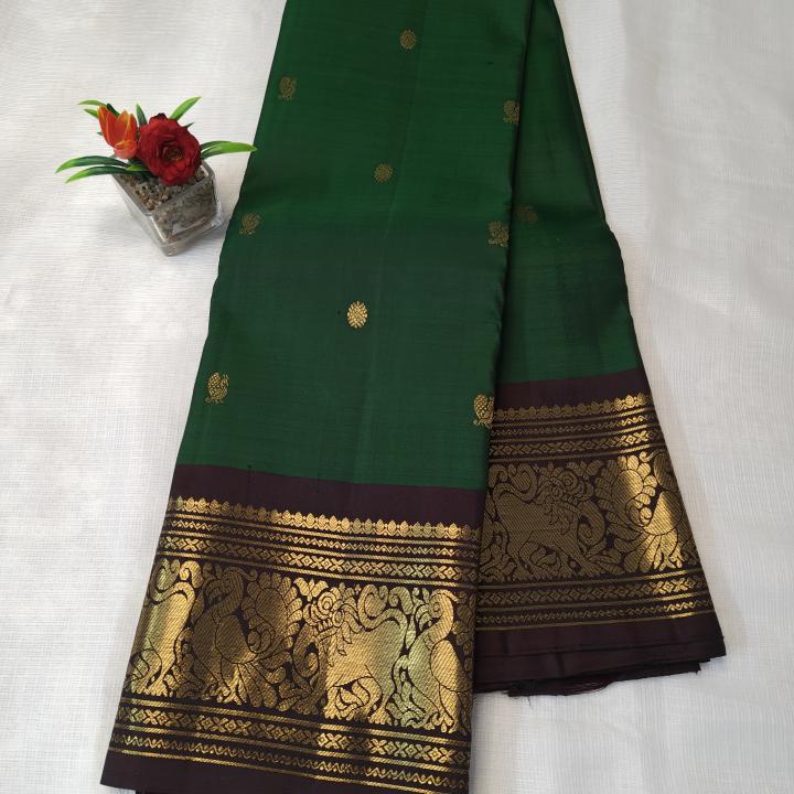 Kanchipuram Emerald Bottle Green Silk Saree with Gold Zari Peacock & Elephant Motifs & Dark Brown Border