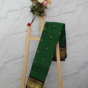 Kanchipuram Emerald Bottle Green Silk Saree with Gold Zari Peacock & Elephant Motifs & Dark Brown Border
