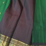 Kanchipuram Emerald Bottle Green Silk Saree with Gold Zari Peacock & Elephant Motifs & Dark Brown Border