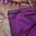 Sunset Peach Silk Saree with Paisley Motifs & Contrast Plum Zari Pallu
