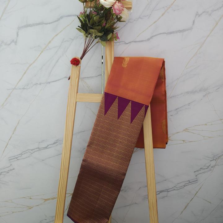 Sunset Peach Silk Saree with Paisley Motifs & Contrast Plum Zari Pallu
