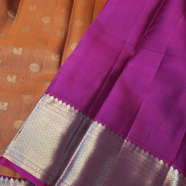 Rust Orange Silk Saree with All-Over Gold Zari Buttas & Contrast Magenta Border