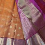 Rust Orange Silk Saree with All-Over Gold Zari Buttas & Contrast Magenta Border